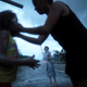 A family bathe with mountain spring water after hurricane Maria hit Puerto Rico